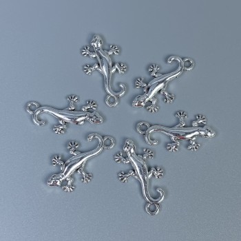 إكسسوار تعليقة سحلية لون المعدن فضي، أبعاد 23×13×2mm+- ثقب، قطر 2mm+- تعبئة 12 قطعة