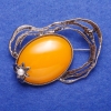 بروش مطروق فضي اللون "كهرماني" (تقليد) 6.7×4.7cm